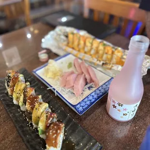 My fave dragon roll , cali and sashimi , total $60ish