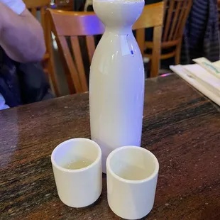 two cups and a bottle