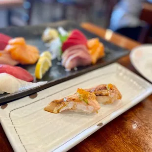 a plate of sushi on a table