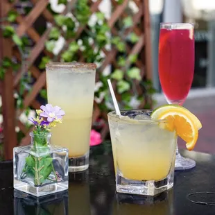 two cocktails on a table