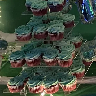 Red velvet cupcake with green frosting they was amazing we also had cake pops everything was delicious