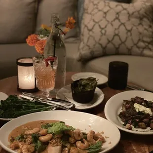 Sitting cozy in the lounge area, dinner, Creole pan seared shrimp w/ broccolini and Waygu beef steak with collard greens