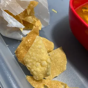 a bowl of soup and tortilla chips