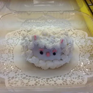 a cupcake in a plastic container