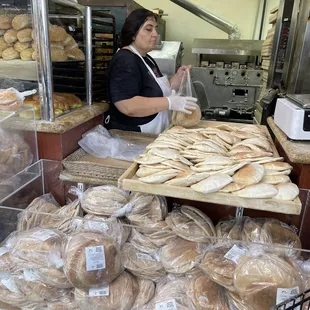 a woman working in a bakery