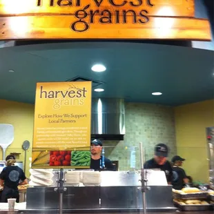 people working behind the counter