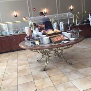 a buffet with a variety of food items