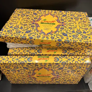 a stack of boxes of tea