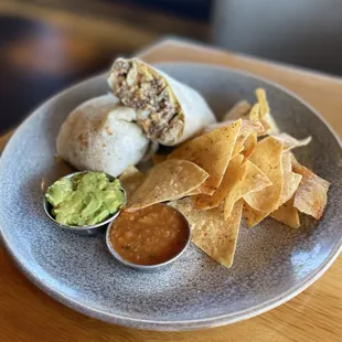Short rib breakfast burrito with side of house chips and salsa