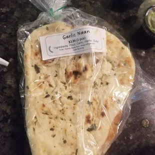 a bag of garlic naan