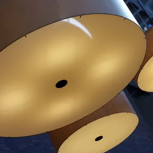 three lamps hanging from the ceiling