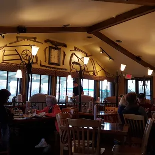 Farm implements on the wall.