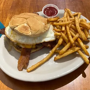 Bacon and egg burger with regular fries