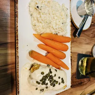 Cod Imperial with risotto and carrots.