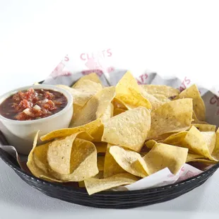 a bowl of chips and salsa