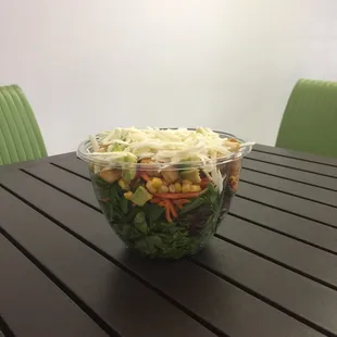 Avocados, corn, sweet peppers, cheese, croutons all topped off with  blend of balsamic mixed with a house dressing!!