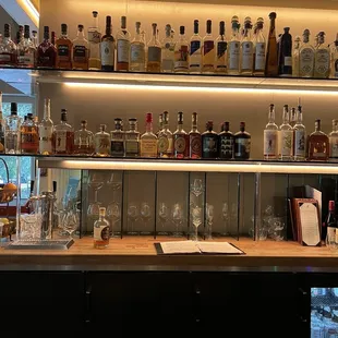 a variety of liquor bottles on shelves