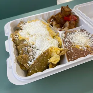 a meal in a styrofoam container