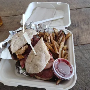 BBQ Hog party special with hand cut fries.