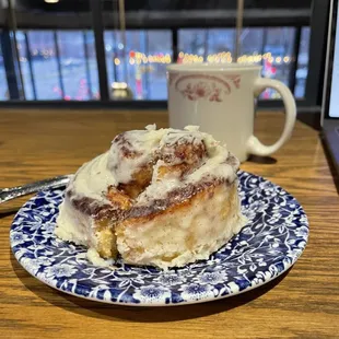 Cinnamon roll and coffee in the upstairs room