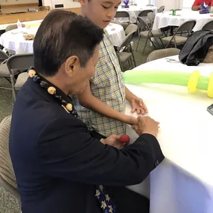 Today's party was a blast.  Doing some table magic.