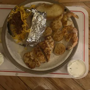 Broiled Seafood Platter with baked potato