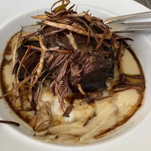 Pork ribs and mashed potato/cauliflower.