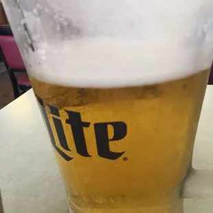 Cold pitchers of beer and chilled glasses.