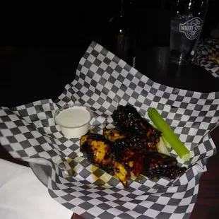 Our wings came back out after we asked for them to be &quot;fried harder&quot; with  crusts of black-burnt thai chili sauce don&apos;t think I will be back