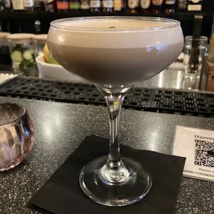 a cocktail in a coupe glass