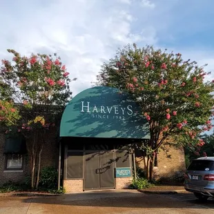 a car parked in front of a building