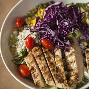 Who says salads are boring, check out our Southern Chicken Salad. Topped with avocado, bacon, corn, bleu cheese and so much more!