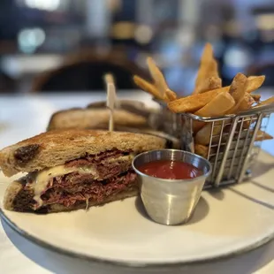 CORNED BEEF SHORT RIB REUBEN house-brined short rib/ duck fat kraut/ 1000 island/swiss/ marble rye