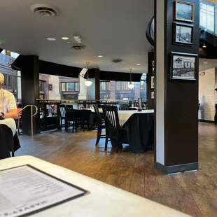 a man sitting at a table in a restaurant