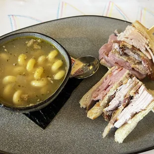 Chicken noodle soup and club sandwich (he cut all veggies)