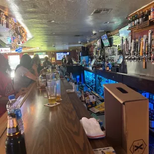 a bar with a wooden bar top