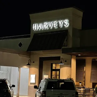 the outside of a restaurant at night