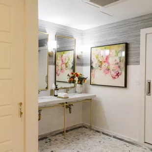 Women's Bathroom. Light and Airy. Perfect for those Extra Touch-Ups.