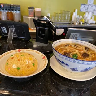 two bowls of food on a counter