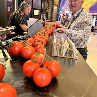 Tomatoes everywhere! Checking in at the hostess stand