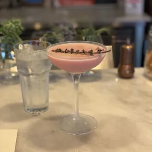 A craft cocktail with prickly pear and lavender!