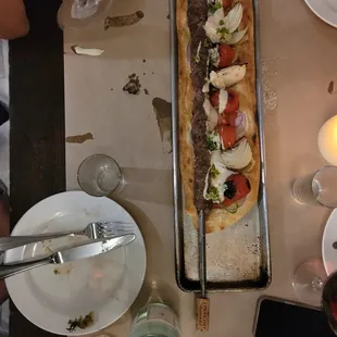 a long tray of food on a table