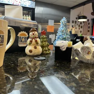 Coffee with the snowman and tree salt and pepper shakers