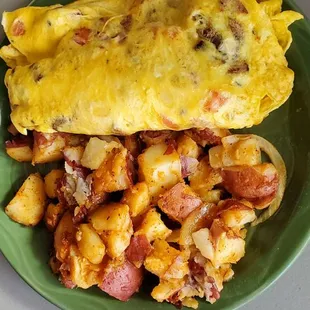 Chicken apple sausage omelet with house potatoes