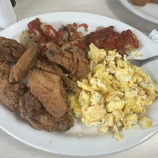 Wings, eggs, and home Fries breakfast