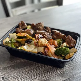 a meal in a black container