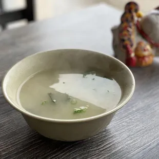 a bowl of soup on a table