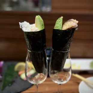 Chef special. My husband asked him to choose the fish and make it for us. Scallop and charred yellow tail hand roll. Delicious!