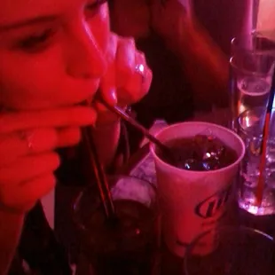 Becky enjoying one. . . Or two beverages. . .