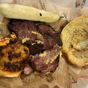 Pastrami on onion bun and knish